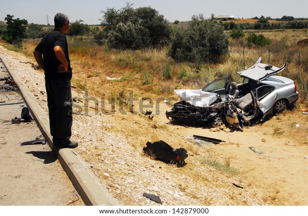 ASHKELON,ISR - JUNE 10:Car accident on June 10\
2008.According to the World Health Organization:1.2M people are\
killed in traffic accidents and about 30M are injured each year\
around the world