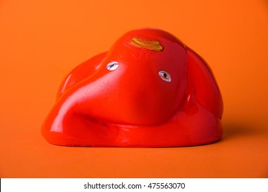 Ashtavinayak / Ganesh Idol, Isolated Over Orange Background