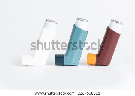 Ashtma inhaler isolated on white background.