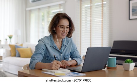 Asia Adult Happy People Or Sme Owner Latin Lady Sit Consult Talk In Online Seminar Reskill Upskill Job Discuss Class For Worker On Desk Table Work At Home In Remote Teach Advice By Digital Training.