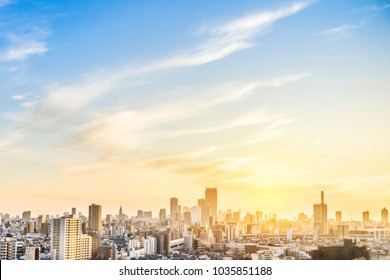 Asia Business concept for real estate and corporate construction - panoramic modern city skyline aerial view of shinjuku area under sunset sky in Tokyo, Japan - Powered by Shutterstock