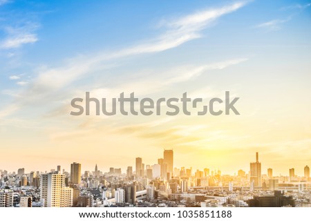 Asia Business concept for real estate and corporate construction - panoramic modern city skyline aerial view of shinjuku area under sunset sky in Tokyo, Japan