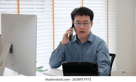 Asia busy people chinese deep tech talent expert man phone call talking working on IT big data science AI center BI smart tools screen. Office asian work cyber bot write low code skill program job.