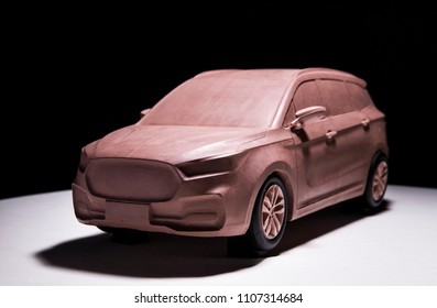 Asia, China, Chongqing - October 25, 2017: A Clay Car Model Made By A Car Designer Is Displayed In The Black Exhibition Room For The Media To Watch