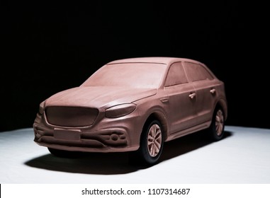 Asia, China, Chongqing - October 25, 2017: A Clay Car Model Made By A Car Designer Is Displayed In The Black Exhibition Room For The Media To Watch