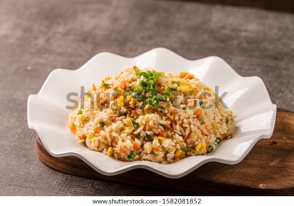 Asia Chinese China food cuisine. Authentic\
Yangzhou fried rice with egg, fresh\
prawn.