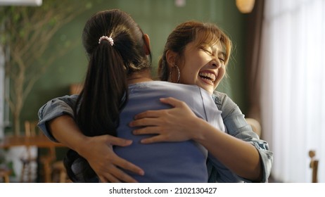 Asia female casual teen laugh smile walk enter to cafe pub bar or coffee shop store open after post covid pandemic. Girl friend invite to fun party enjoy good news trust warm time in youth people. - Powered by Shutterstock