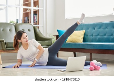 Asia Korean Young Girl Home Workout Training In Living Room   