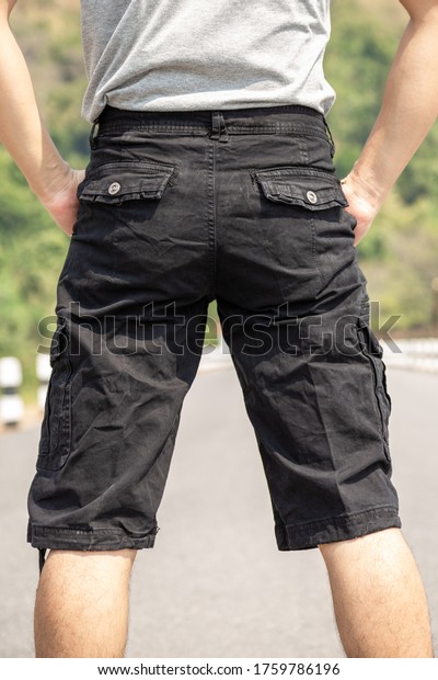 Asia man in bermuda shorts and t-shirt, outdoor
activity concept