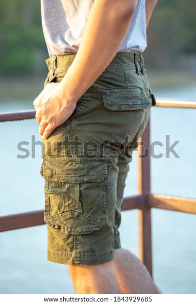 Asia man in bermuda shorts and t-shirt, outdoor\
activity concept