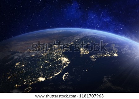 Asia at night from space with city lights showing human activity in China, Japan, South Korea, Hong Kong, Taiwan and other countries, 3d rendering of planet Earth, elements from NASA