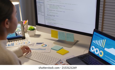 Asia people MBA college woman work busy at late night home office online study on laptop typing coding search data for future job career reskill upskill workforce IT cyber class remote virtual learn. - Powered by Shutterstock