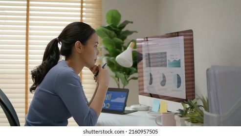 Asia people talent young woman study hard burnout brownout bored remote learn online read data tired sitting head in hand at home office desk workplace think worry in job tough stress workforce issue.