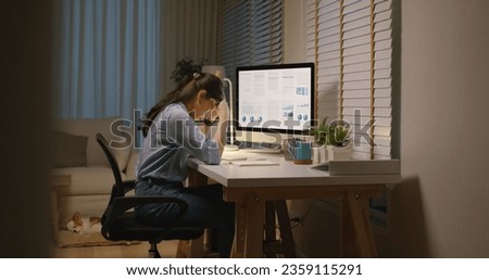 Asia people young woman study hard overnight brownout bored remote learn online read data tired sitting head in hands at home office desk workplace think worry in job tough stress workforce issue.
