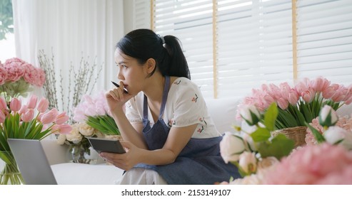 Asia people young woman thoughtful looking away doubtful stress worry in bad news financial economy recession cash flow crisis in small SME issue impact from covid coronavirus at home office store.