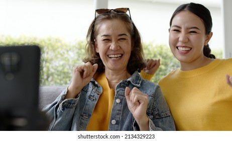 Asia Senior Parent And Girl In Mom Day Joy Play Music Recording Vlog Viral Shooting On Social Media App IG Reel Story Tiktok At Home  Love Warm Good Time. Child Teen Enjoy Fun Life Relax Smile Laugh.