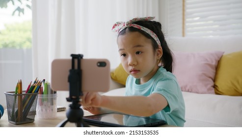 Asia Small Kid Young Youtuber Vlogger Influencer Fun Live Show Drawing Paint Class Selfie Shoot Online VoIP Video Call Social Media App. Happy Child Gen Z Artist Girl Play And Learn Hobby At Home.