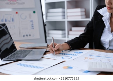 Asia stock trader agent or Sale tax loan broker advice brief and point hand to graph report talk to client at office desk show budget chart data or legal result on claim form. Trust will in work plan. - Powered by Shutterstock