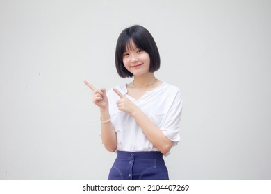 asia thai teen White t-shirt beautiful girl pointing - Shutterstock ID 2104407269