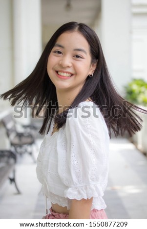 asia thai teen White t-shirt beautiful girl smile and relax