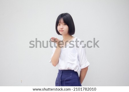 asia thai teen White t-shirt beautiful girl Send a kiss