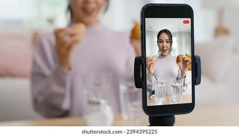 Asia vlogger woman influencer smile enjoy hobby happy fun live online screen  reel  at home Gen Z teen girl talent people play selfie camera shoot  app show share viral edtech video
