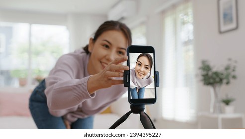 Asia vlogger woman influencer smile enjoy hobby happy fun live online screen  reel  at home Gen Z teen girl talent people play video selfie camera shoot  app show share viral story