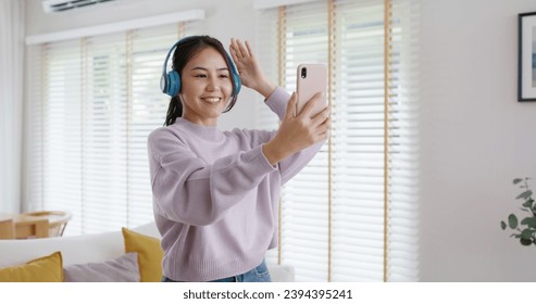 Asia vlogger woman influencer smile enjoy hobby happy fun live online screen  reel  at home Gen Z teen girl talent people play selfie filter camera shoot  app show share viral video