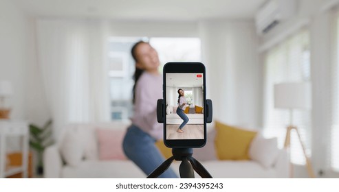 Asia vlogger woman influencer smile enjoy hobby happy fun live online screen  reel  at home Gen Z teen girl talent people play video selfie camera shoot  app show share viral story