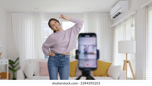 Asia vlogger woman influencer smile enjoy hobby happy fun live online screen  reel  at home Gen Z teen girl talent people play video selfie camera shoot  app show share viral story