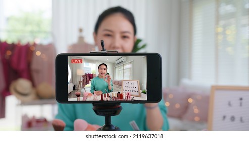 Asia woman micro influencer record live viral video camera at home studio. Happy youtuber fun talk speak advice review hobby in media. Vlogger selfie shoot enjoy work show smile teach like share app.