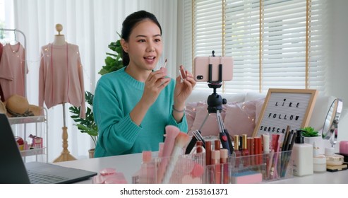 Asia woman micro influencer record live viral video camera at home studio. Happy youtuber fun talk speak advice review hobby in media. Vlogger selfie shoot enjoy work show smile teach like share app.