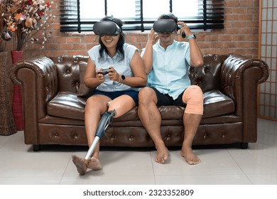 Asia woman with prosthetic leg and boyfriend play game of VR at home	 - Powered by Shutterstock