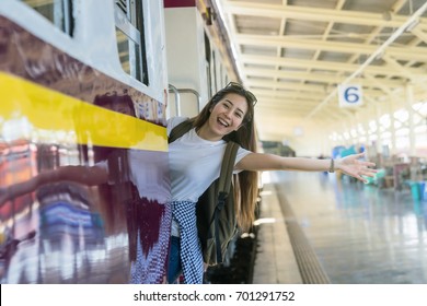 Asia Woman Traveller Feeling Happiness Before Go To Travel At The Train Station, Travel And Lifestyle Concept