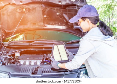 Asia Women Change New Air Filter Engine Of Car Basic Check And Service Concept For Texture In Automobile Maintenance Work In Engine Room