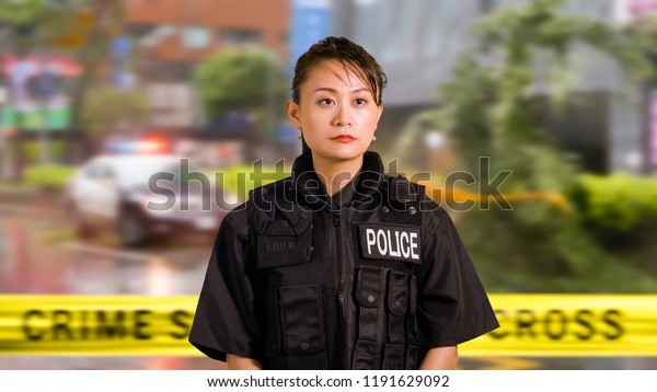 Asian\
American Woman Police Officer at Crime\
scene
