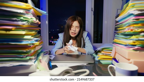 asian angry young businesswoman is overworking because business is failure at night - Shutterstock ID 2149687337