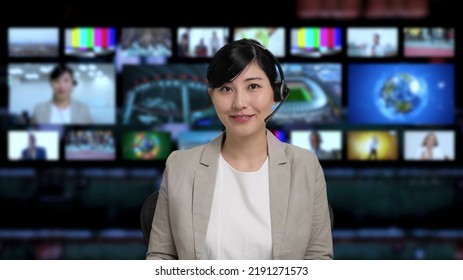 Asian Announcer Appearing On News Program.