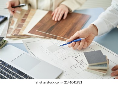 Asian architect designing a house