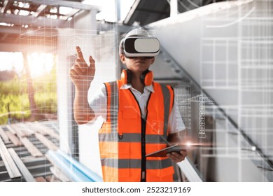 Asian architect engineer using VR tablet graphical ui screen simulation plan design blueprint, futuristic program architectural innovation, construction site building project using modern technology.