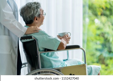 Asian Attractive Woman Doctor And Nurse Takecare Old Senior Patient Disabled On Wheelchair In Hospital Health And Support Ideas Concept