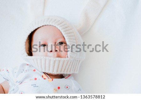 Similar – Closeup  of baby girl with pacifier sleeping