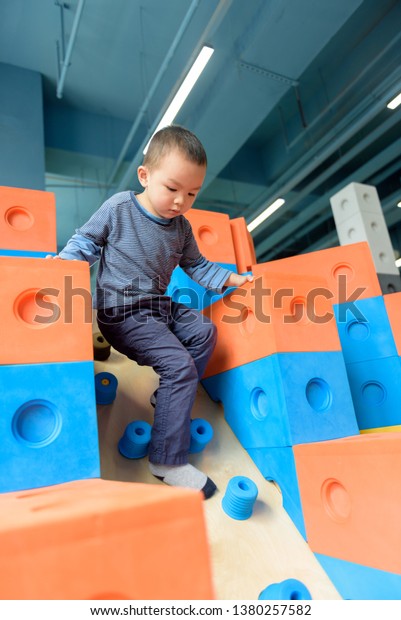 baby climbing blocks