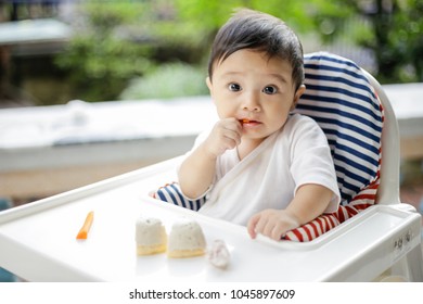 Asian Baby Boy Eat With Finger Food