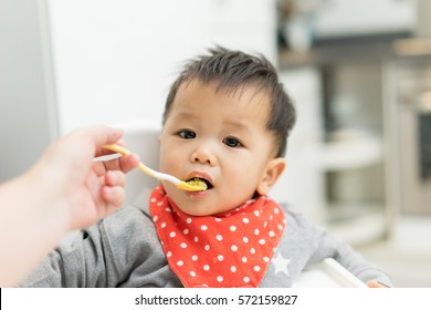 Asian Baby Boy Eating Blend Food Stock Photo (Edit Now) 566856907