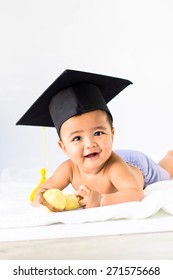 Asian Baby Boy Wearing A Graduation Black Cap