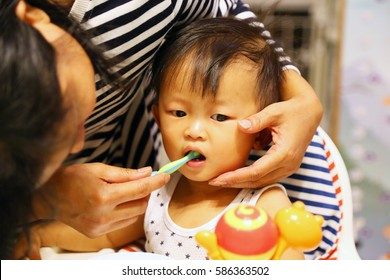 Asian Baby Brush Teeth By Mother