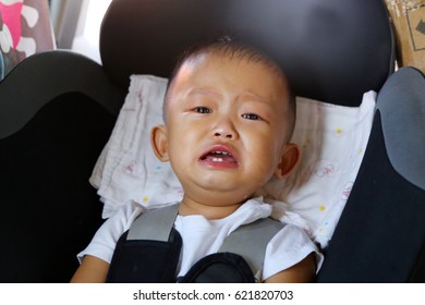 Asian Baby Crying On Car Seat