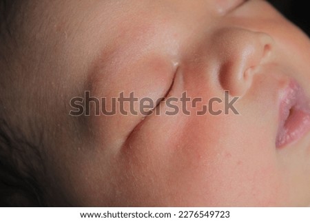 asian baby face sleeping, round shape with smooth white skin