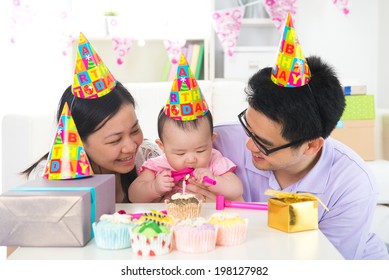 Asian Baby With Family Celebrating Baby Birthday Party